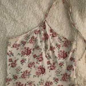 White and flowery top.